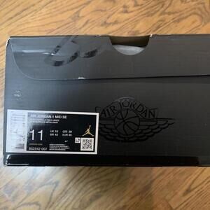 Black and gold Jordan 1 Mid Metallic Gold Patent Black white